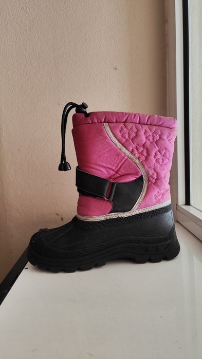 Botas de neve de criança