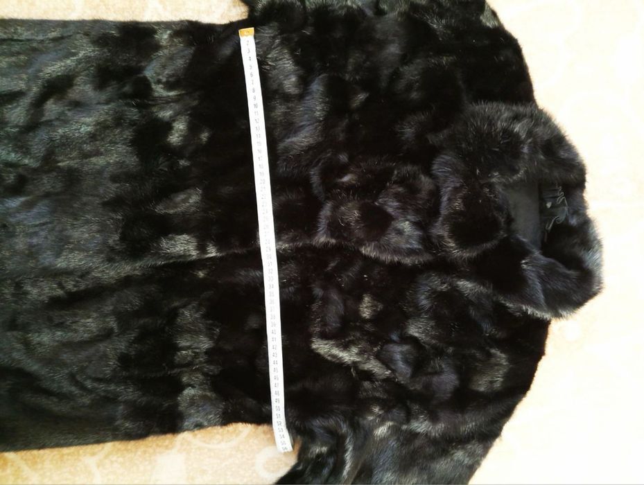 норкові шуби дві