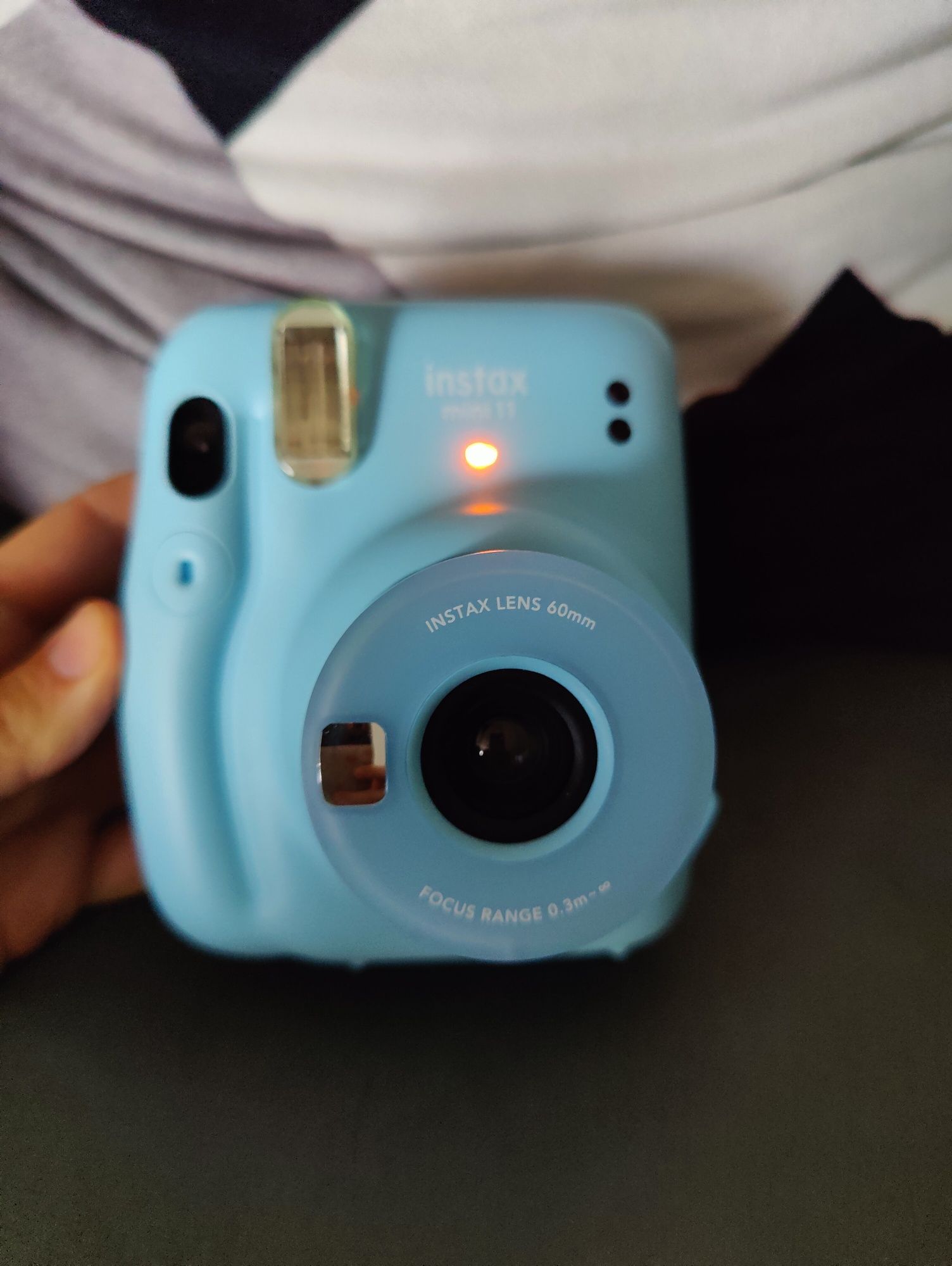 Máquina fotográfica instax