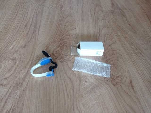 Opaska na kostkę lub rękę z niebieską lampką LED
