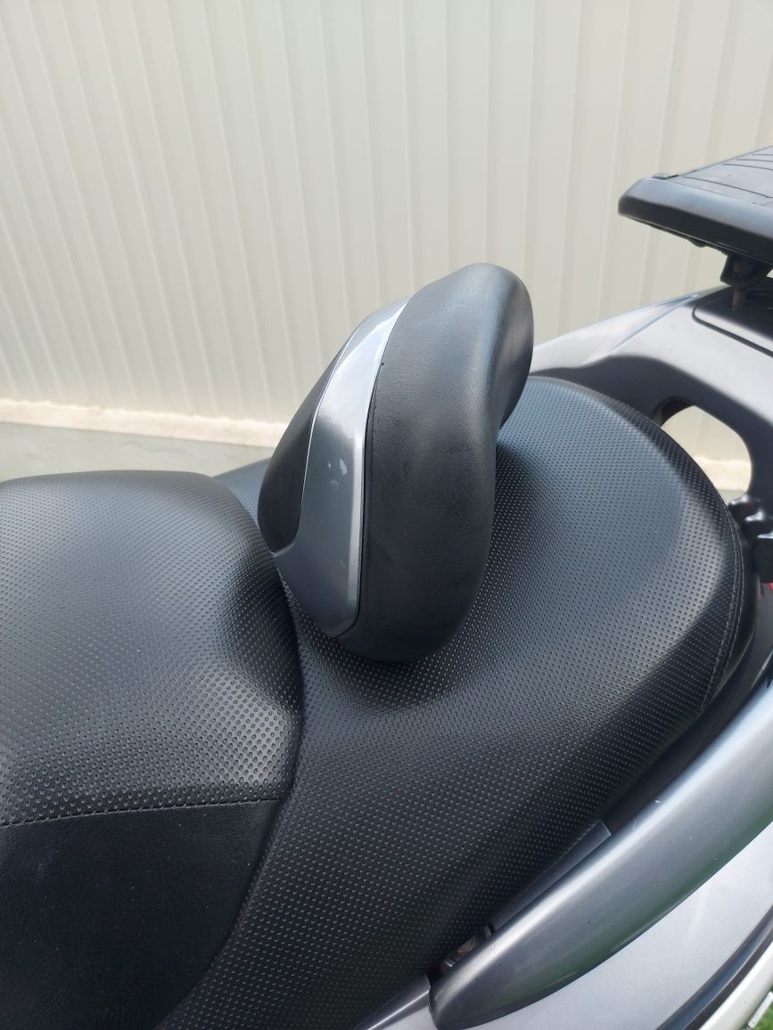 Sym gts 125i Evo excelente estado com top case. Não pretendo trocas.