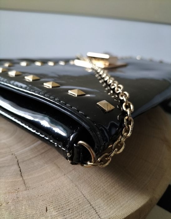 Torebka kopertówka Dune czarna ćwieki złoto