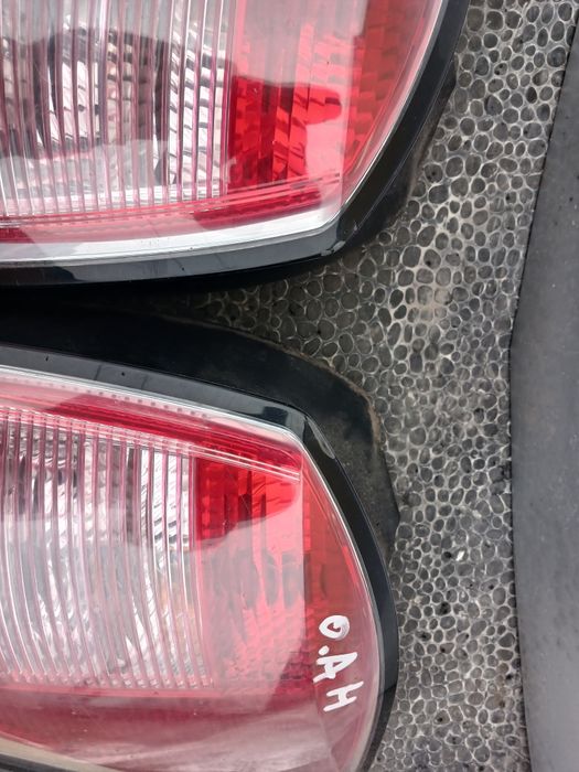 Задні ліхтарі стопи Opel adtra h унівепсал