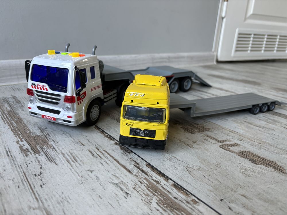 Samochody ciężarowe truck tir laweta auta Man świeci gra
