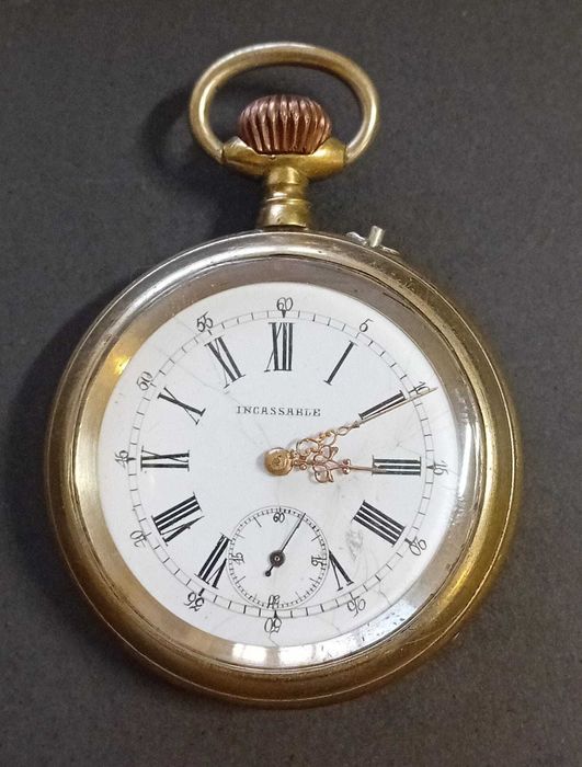 Relógio de bolso antigo e a trabalhar