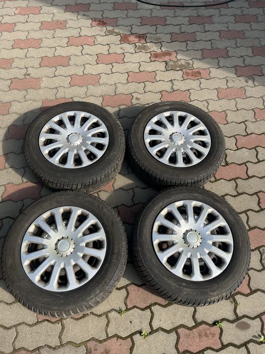 Диски з резиною і ковпаками оригінал R15 Ford Focus