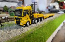 MAN TGX ciągnik balastowy z naczepą niskopodwoziową 1/87