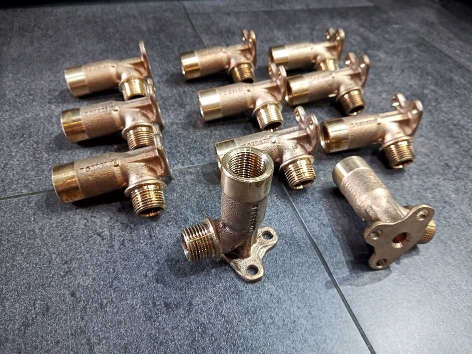 Geberit Mepla kolano z łapą 1/2 73 mm