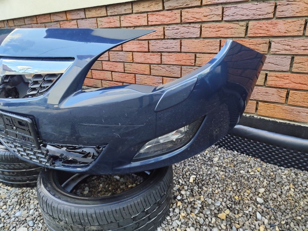 Zderzak skorupa kierunkowskazy opel astra j z22a xenon spryskiwacz