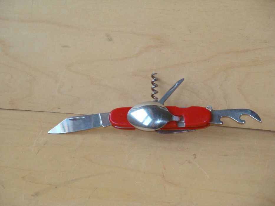 продам оригинальный новый нож складной туристический - 6 предметов вес