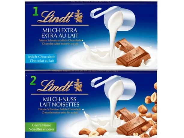 Молочный шоколад Lindt с молоком и с цельным лесным орехом.