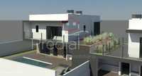 Moradia T4 - Em construção com garagem e piscina na Sobreda Caparica