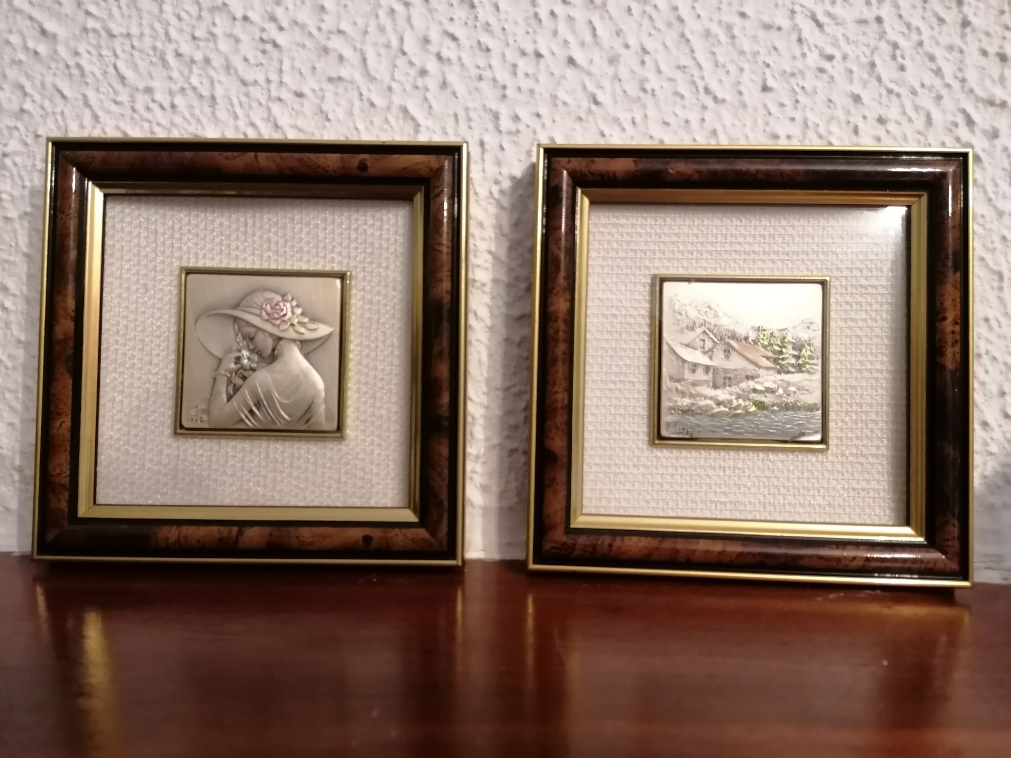 Quadros com criação artística sobre placa de prata