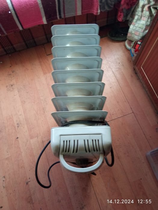 Продам масляный обогреватель CELCIA YANO1-9 2000W 8 секций обогрева