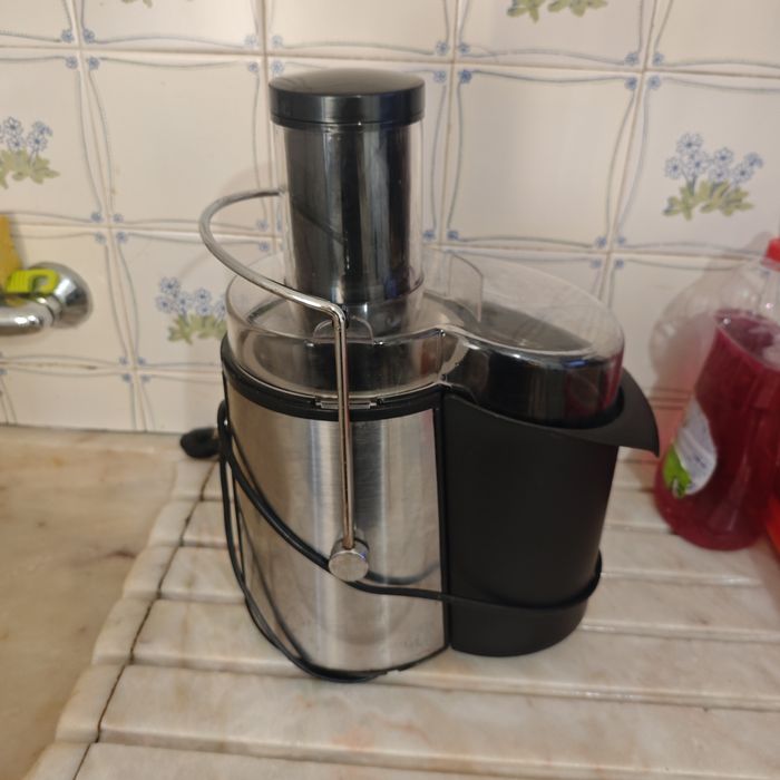 Triturador com depósito