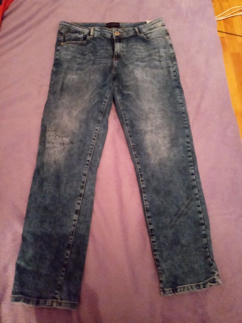 Spodnie jeansy Reserved
