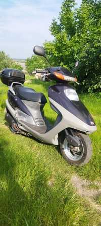 Honda Spacy 125 Двомісний скутер.