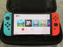 Nintendo Switch Oled com 4 jogos e estojo c muito pouco uso