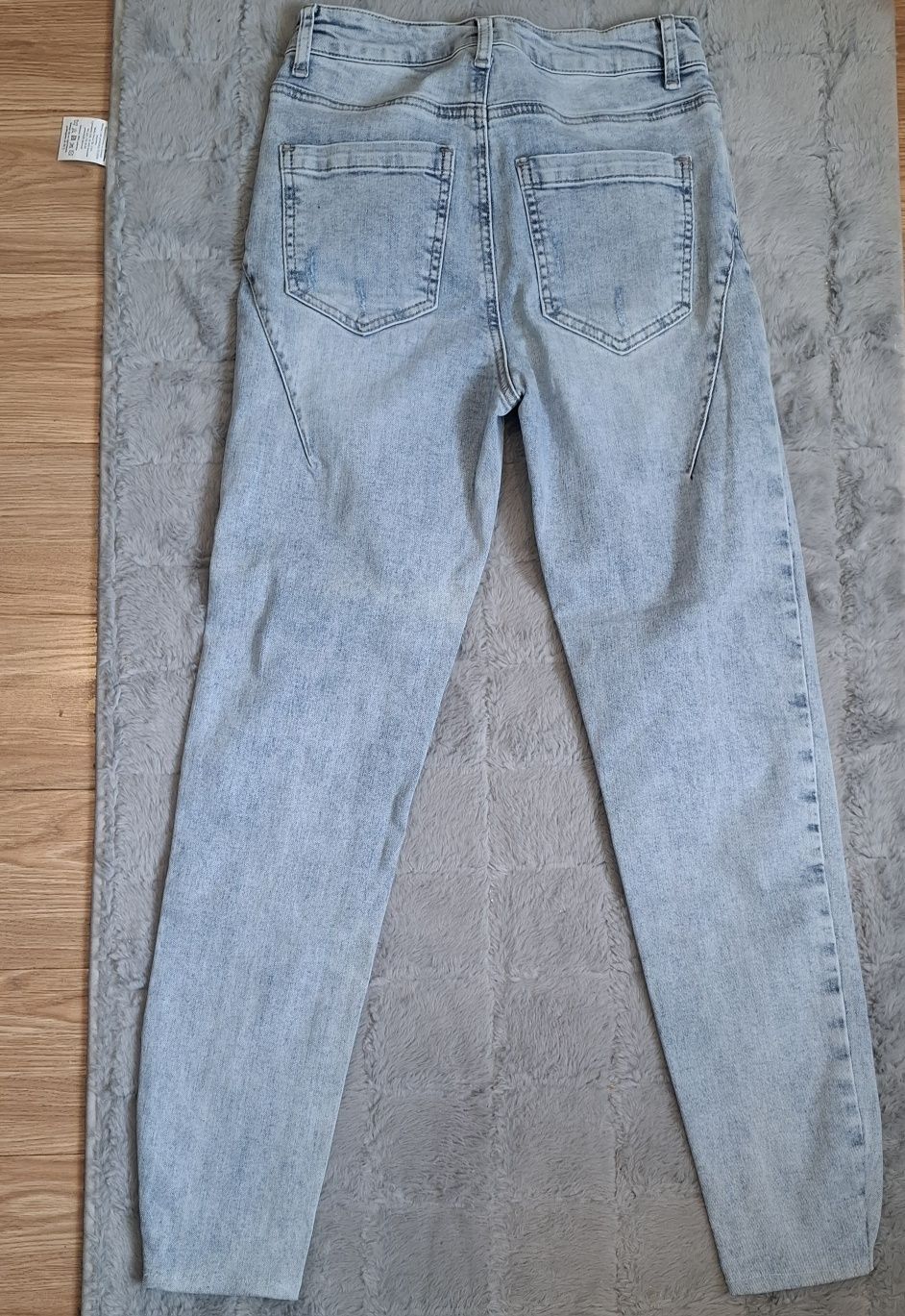 Nowe jasne jeansy damskie z przetarciami – skinny fit