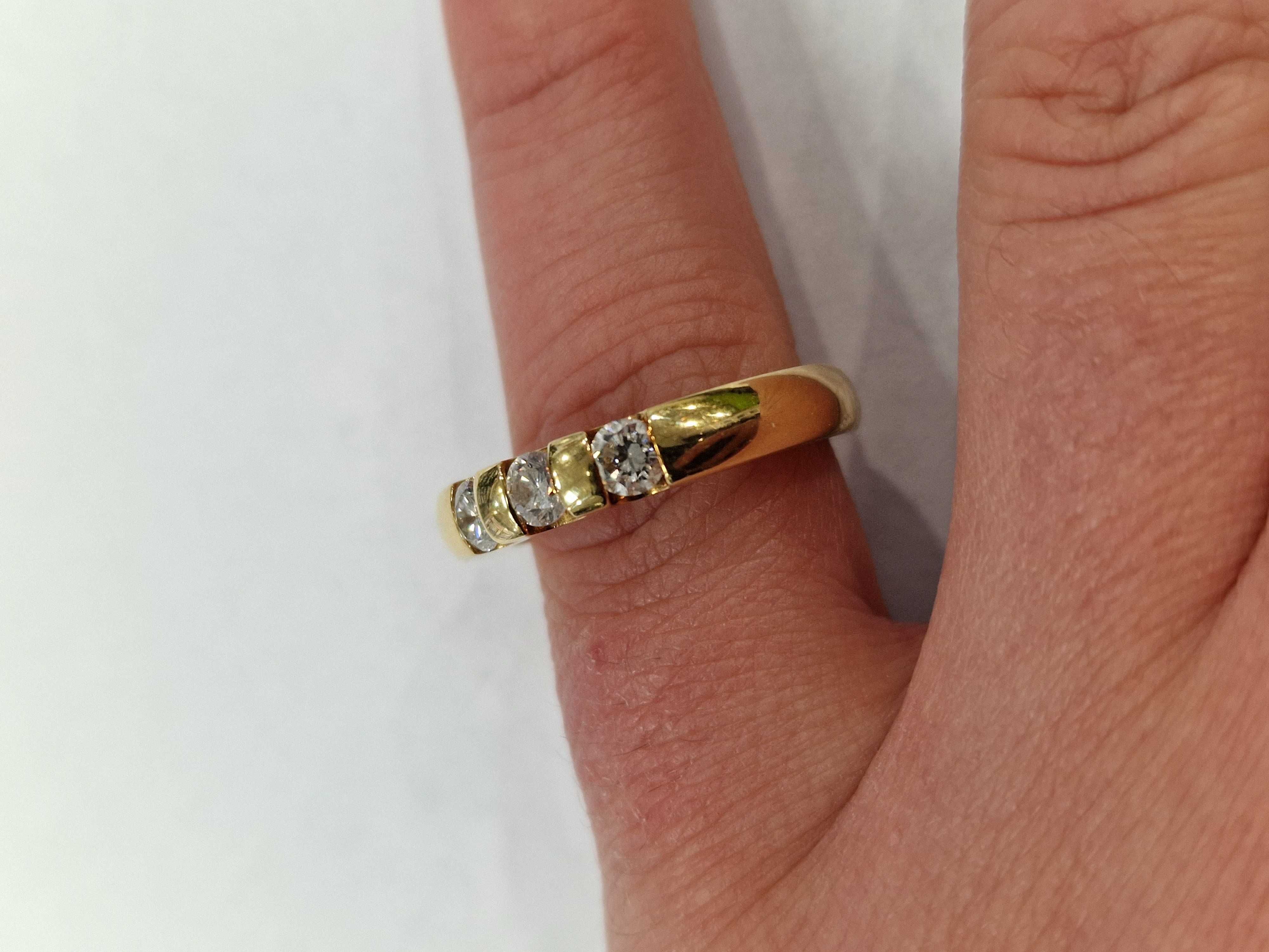 Złoty pierścionek/ obrączka/ 750/ 9.02 gram/ R14/ 0.50 CT/ XX wiek