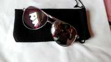 Oculos de sol novos