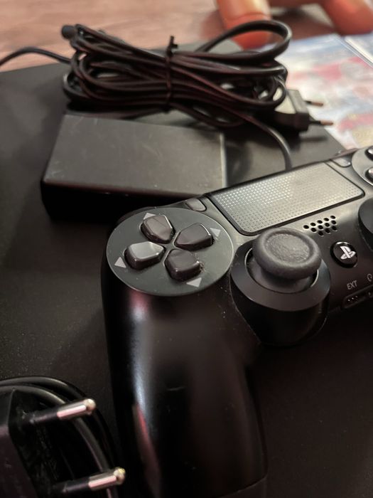 PlayStation 4 SLIM nowy dysk ssd/termopasta+ładowarka do padow i 4gry