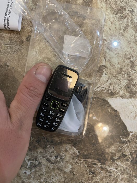 Є в наявності ! Міні телефон розміром пелець SERVO BM310
