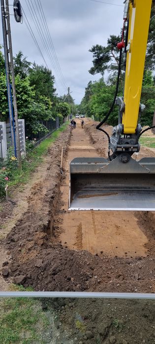 Budowa zbiorników  koparka czyszczenie rowów stawów wynajem