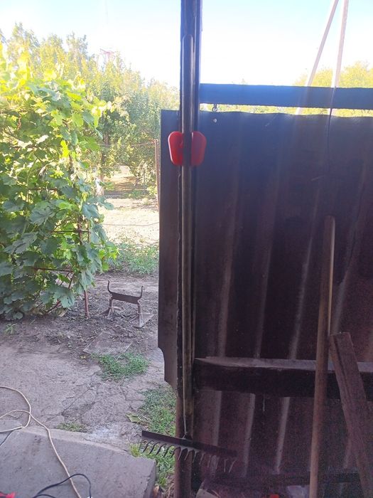 Автоматичний тримач для садового інструменту