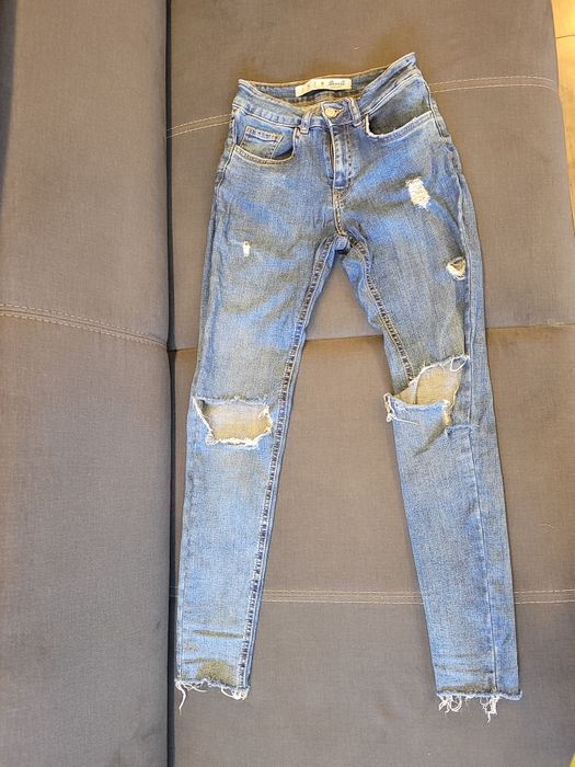 Spodnie jeansowe dziurawe 34 XS szarpane