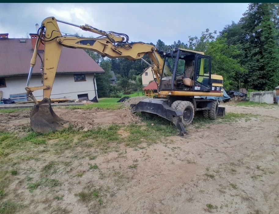 Usługi koparką koparko-ładowarka transport wywrotka