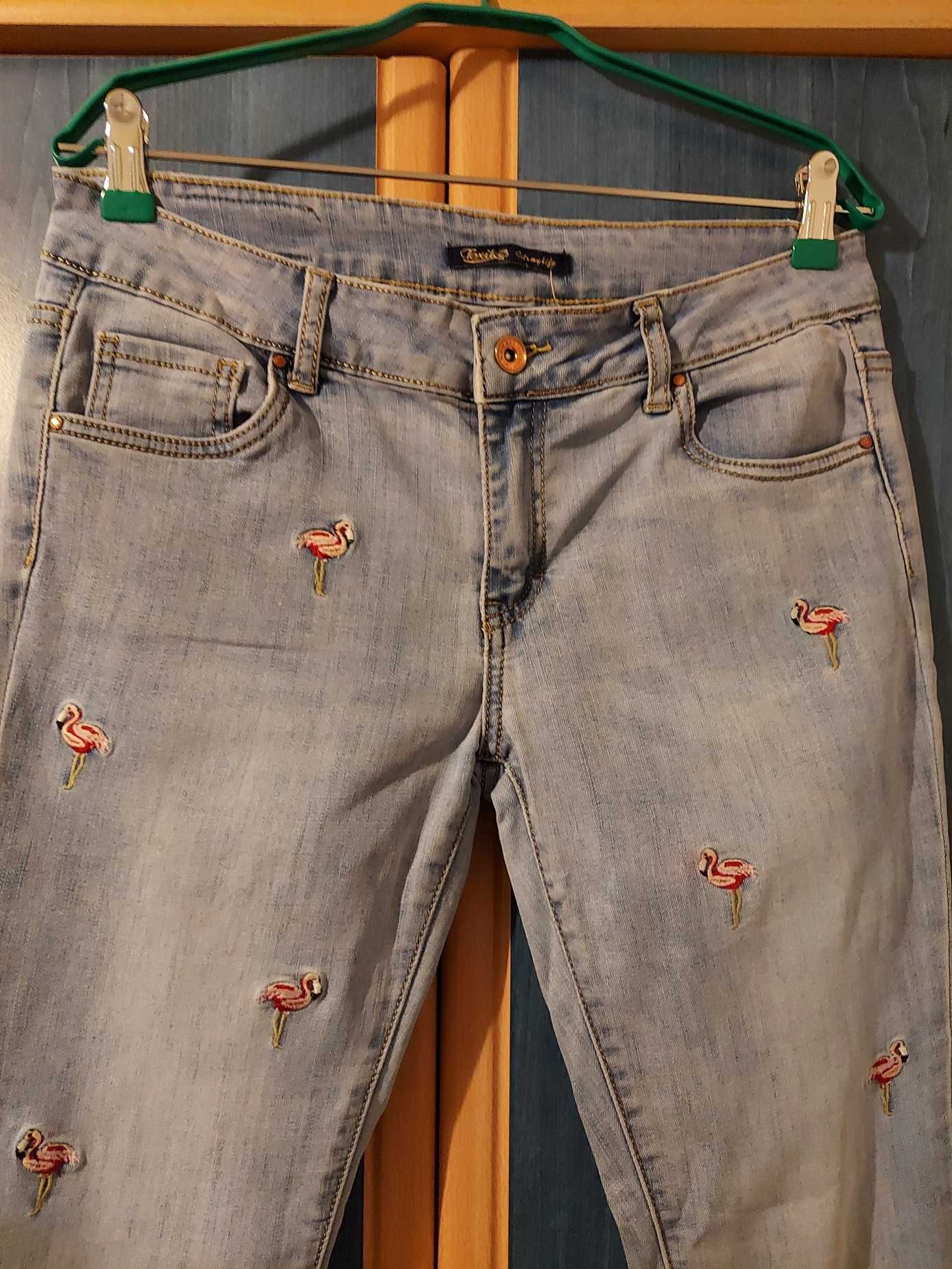 Spodnie jeans TOXIK rozm 42/ 38M flamingi