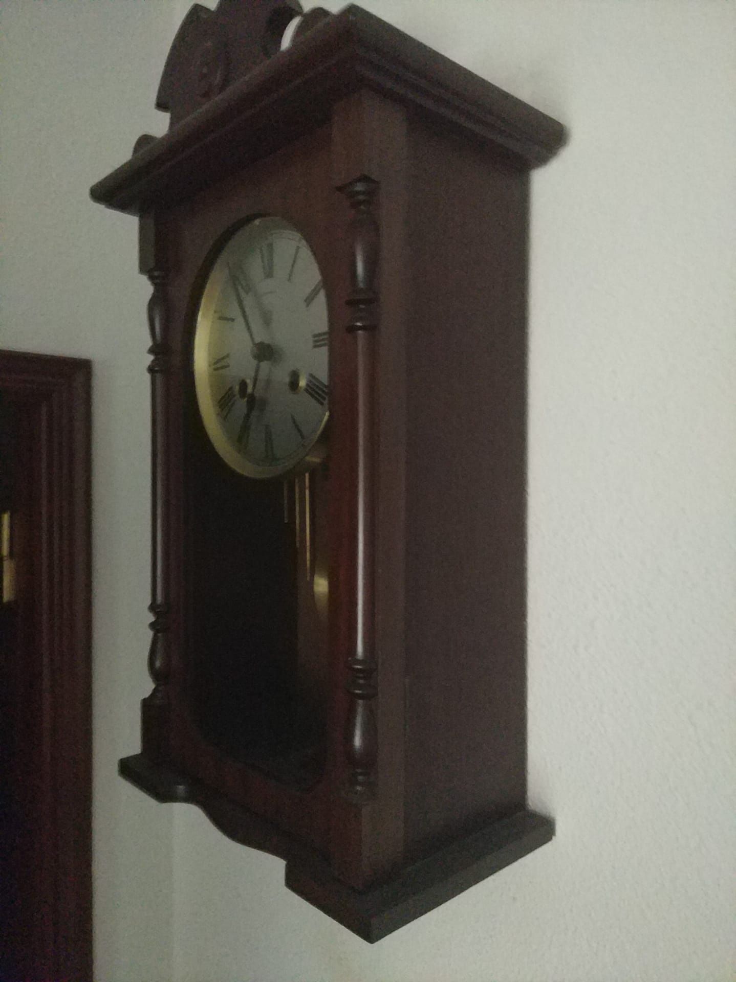 Relógio pêndulo antigo