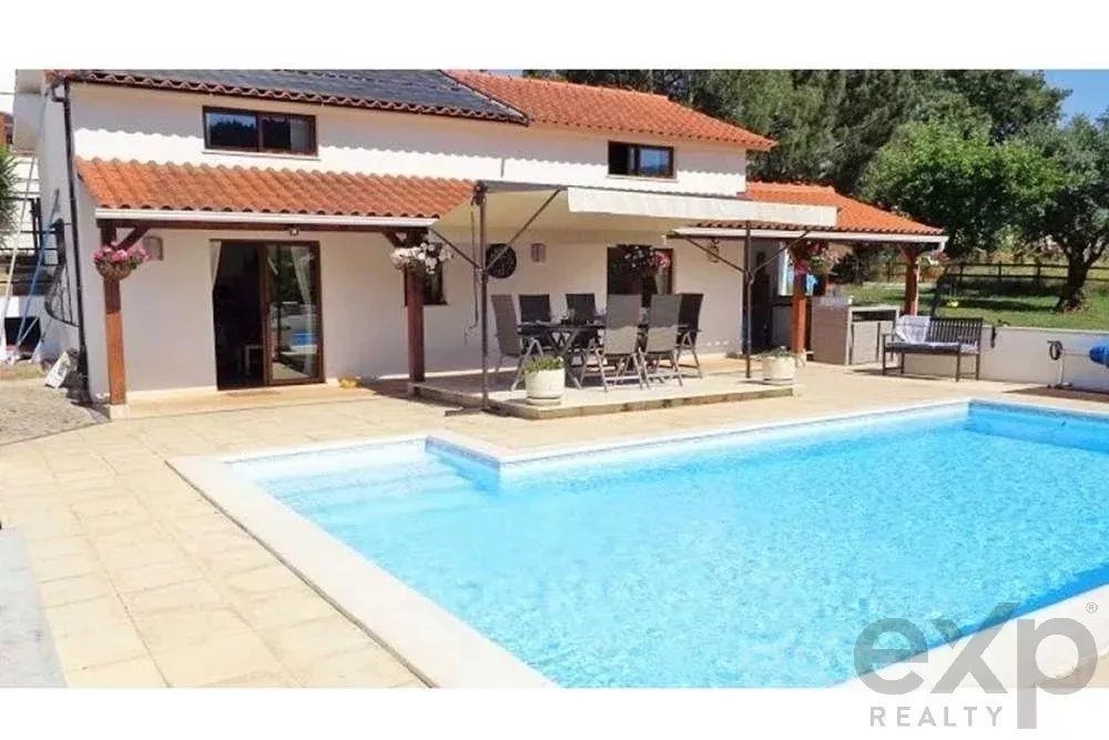 Casa de família com alojamento para hóspedes