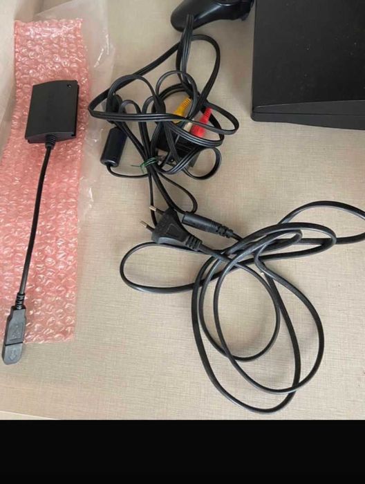 Playstation3 slim  + comando + cabos + jogo + eye pet + peça singstar