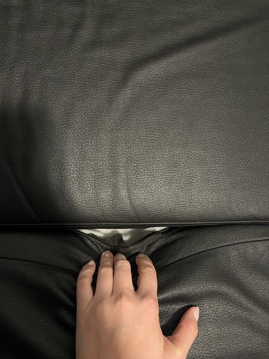 Czarny narożnik z funkcją spania