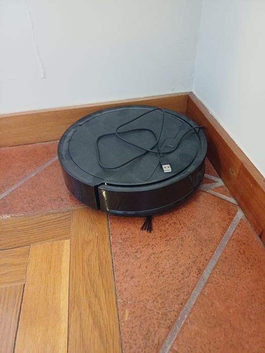 Robot aspirador automático.