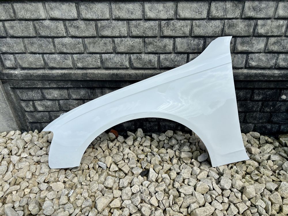 Blotnik przedni lewy bez rdzy bialy AUDI A4 B8 FL lift 12-16 oryginal