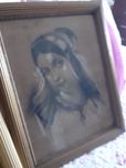 Quadros centenários emoldurados com retratos desenhados a carvão