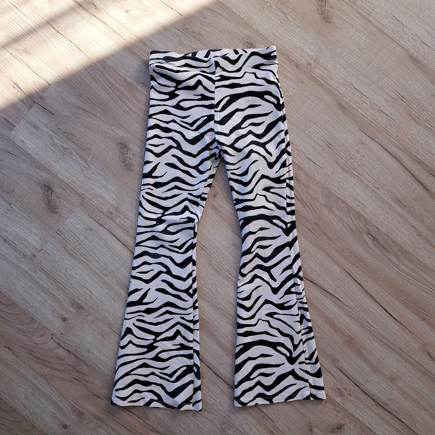 Dziewczęce legginsy flare zebra Marks&Spencer, rozmiar 152