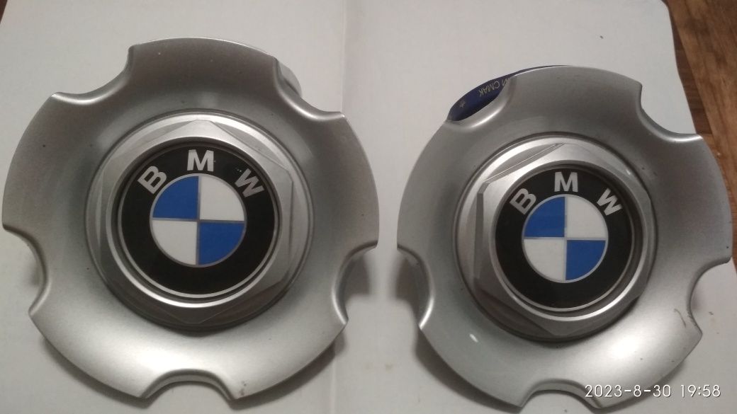 Колпачки на колёса BMW .