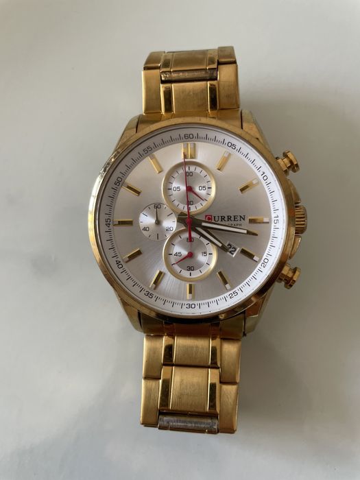 Relógio Curren.