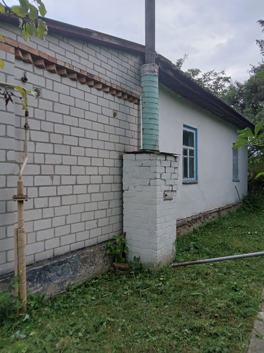 Будинок та земельна ділянка