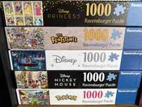 Puzzle 1000 el. ravensburger Disney Mała syrenka, Myszka Miki. pokemon