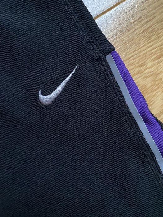 Damskie legginsy getry spodenki 3/4 sportowe do biegania Nike roz. S
