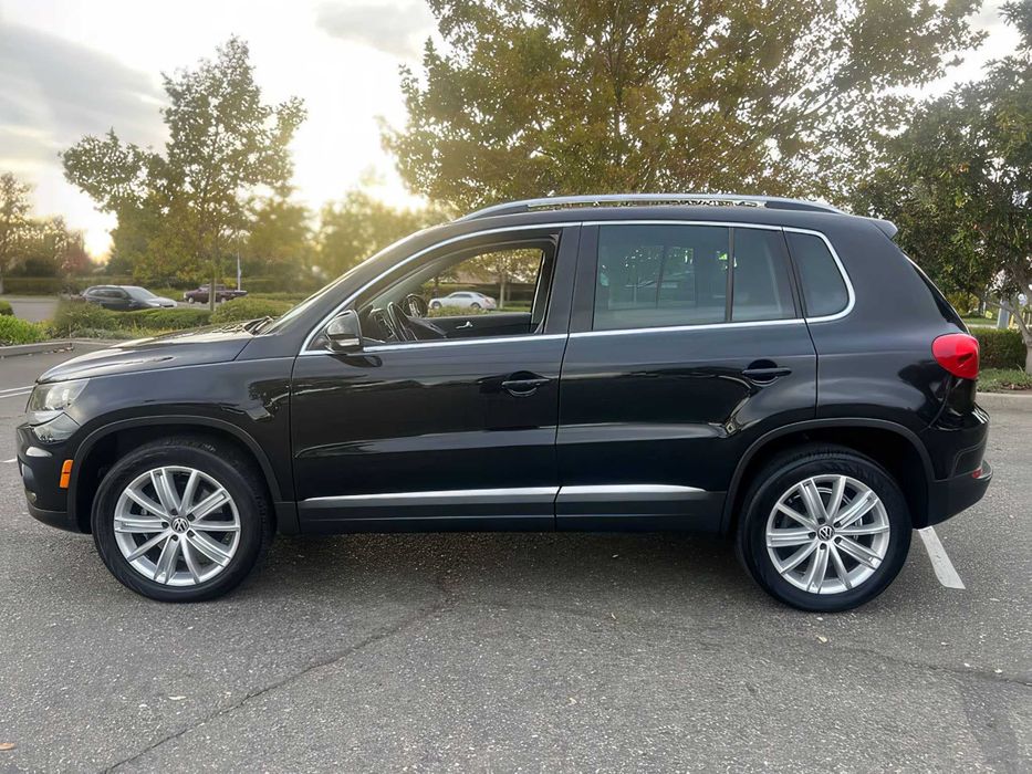 Volkswagen Tiguan      2014