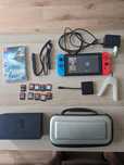 Nintendo Switch + 11 juegos + estuche + SD card