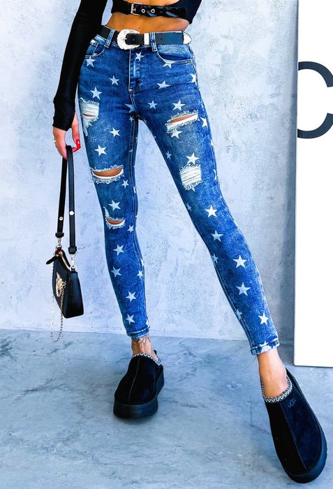 Granatowe jeansy rurki zdobione dziurami gwiazdki rozm.M