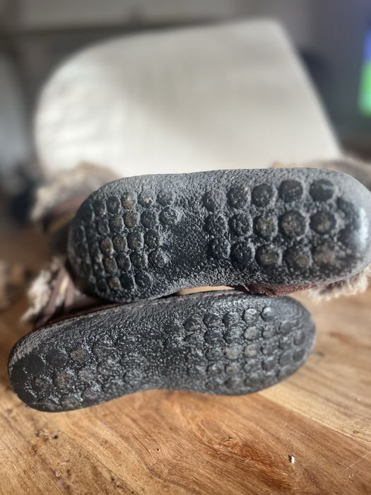 Botas castanhas de Pelo