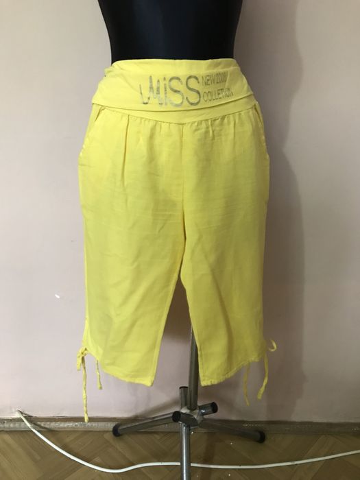 Komplet żóto- czarny nluxka i spodenki Moda Grinta roz. M